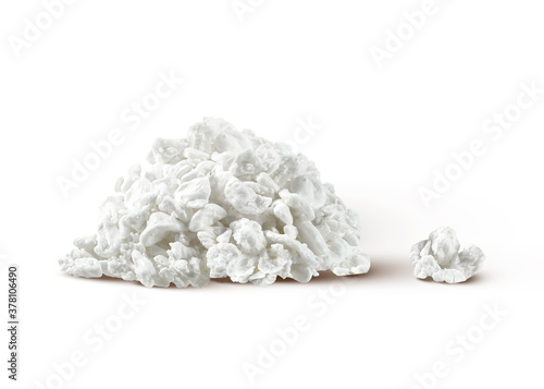 Homemade organic milk product - fresh cottage cheese on a white background.