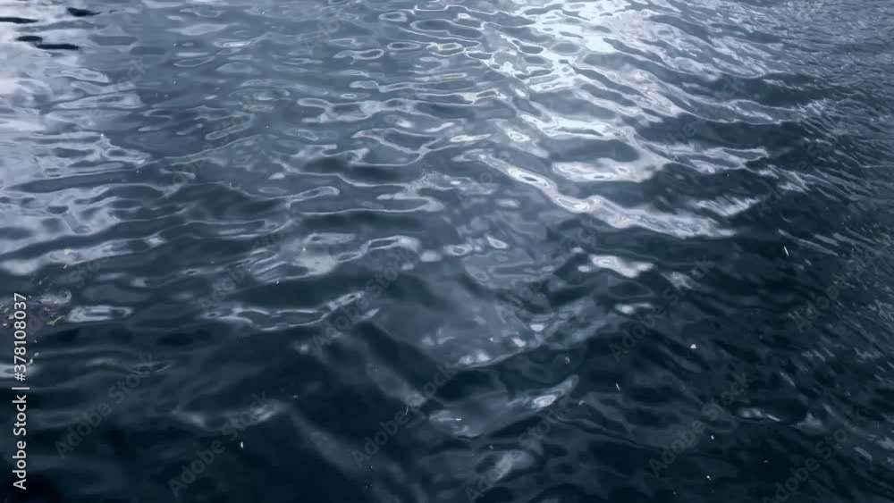 Reflection in the waves of the river water. Water waves. Reflection in the waves of the river water. Water waves.
