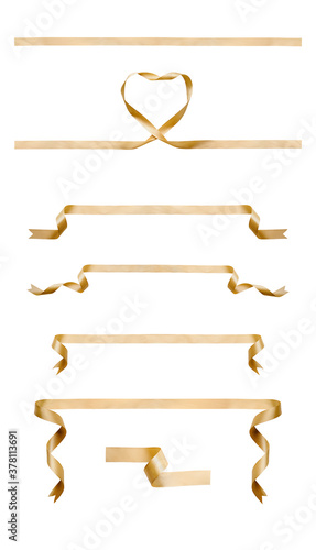 Obraz na płótnie A collection of curly gold ribbon Christmas and birthday present banner set isolated against a white background. w salonie