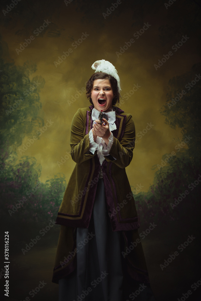 Shoting gun, killer. Modern trendy look, portrait of renaissance period beautiful woman. Retro style, comparison of eras concept. Caucasian female model like classic historical character, old Shoting gun, killer. Modern trendy look, portrait of renaissance period beautiful woman. Retro style, comparison of eras concept. Caucasian female model like classic historical character, old