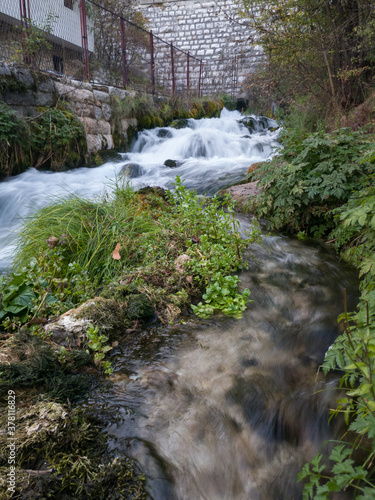 Mountain stream Plava Voda in Travnik in autumn during the day. photo