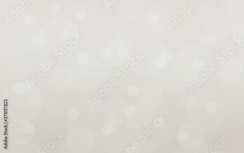 Abstract silver bokeh background with soft lights.
