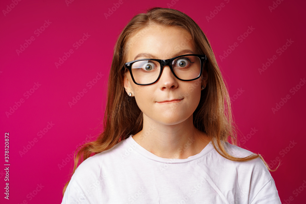 Portrait of a young attractive caucasian woman in glasses