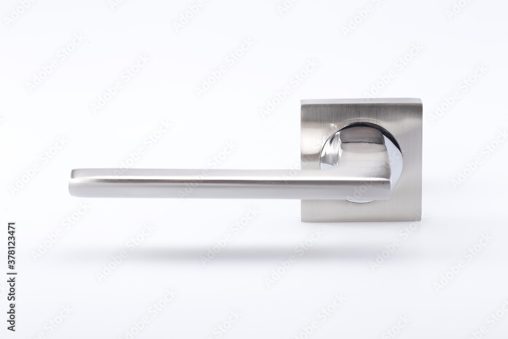 Silver metal door handle on a white background.