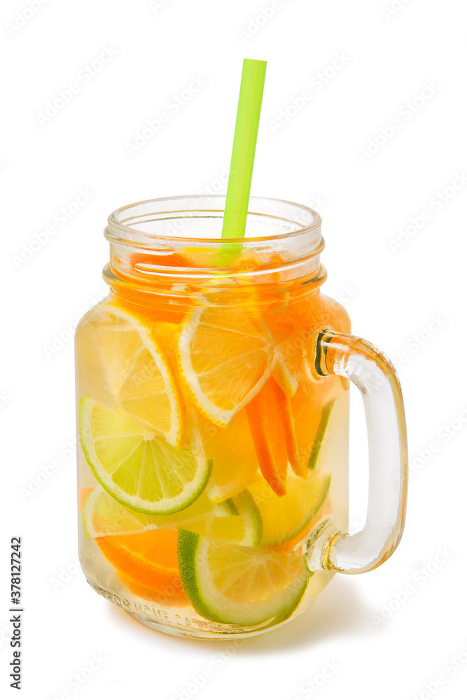 Cold fresh detox beverage of lemon, orange, lime with water in jar glass , isolated on white background Cold fresh detox beverage of lemon, orange, lime with water in jar glass , isolated on white background