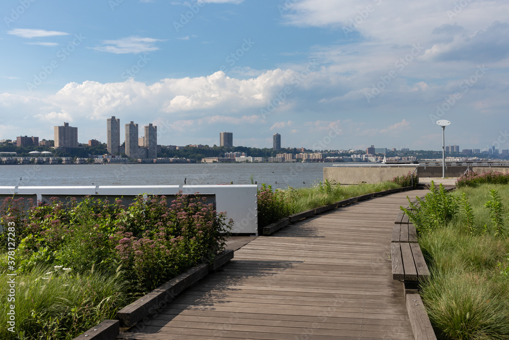 Empty Walkway at Riverside Park South along the Hudson River in Lincoln Square New York during Summer Empty Walkway at Riverside Park South along the Hudson River in Lincoln Square New York during Summer