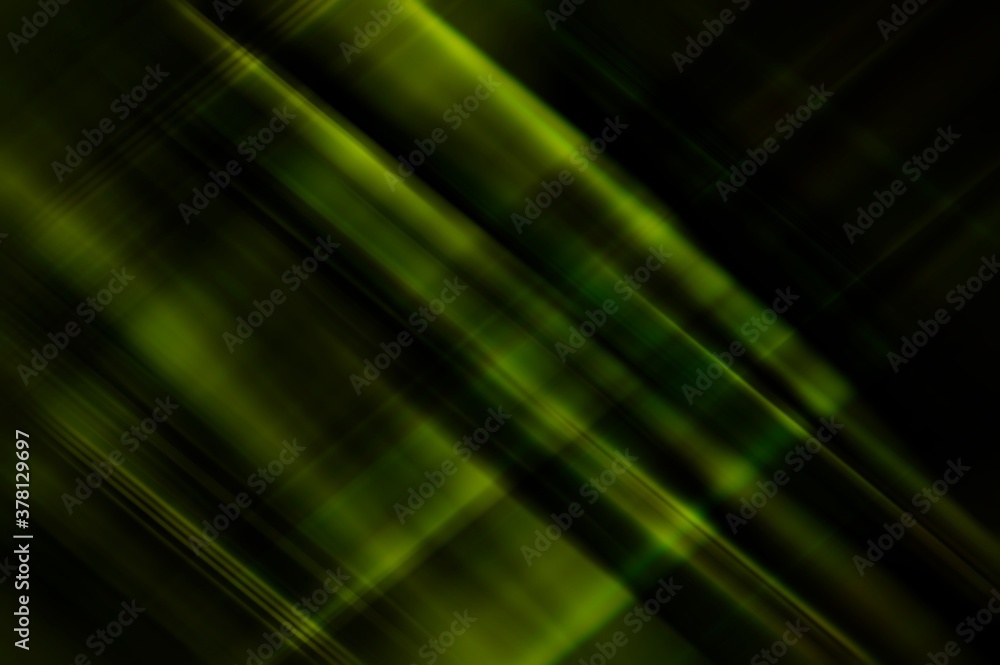 Abstract background blurred green yellow rays light on black with the gradient texture lines effect motion design pattern graphic diagonal.