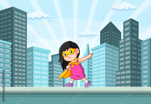 The super heroes girl and posing in the city near the building
