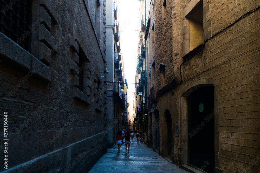 Barcelona, Catalonia, Spain, September 22, 2019 Unknown people walk through the streets of Barcelona in the Gothic quarter.