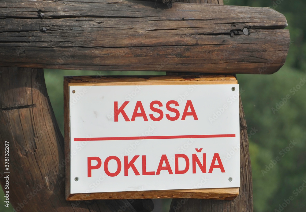 VLKOLINEC, SLOVAKIA, EUROPE, SUMMER. Poster written in Slovak seen on Vlkoline where it indicates that you have to pay there. 