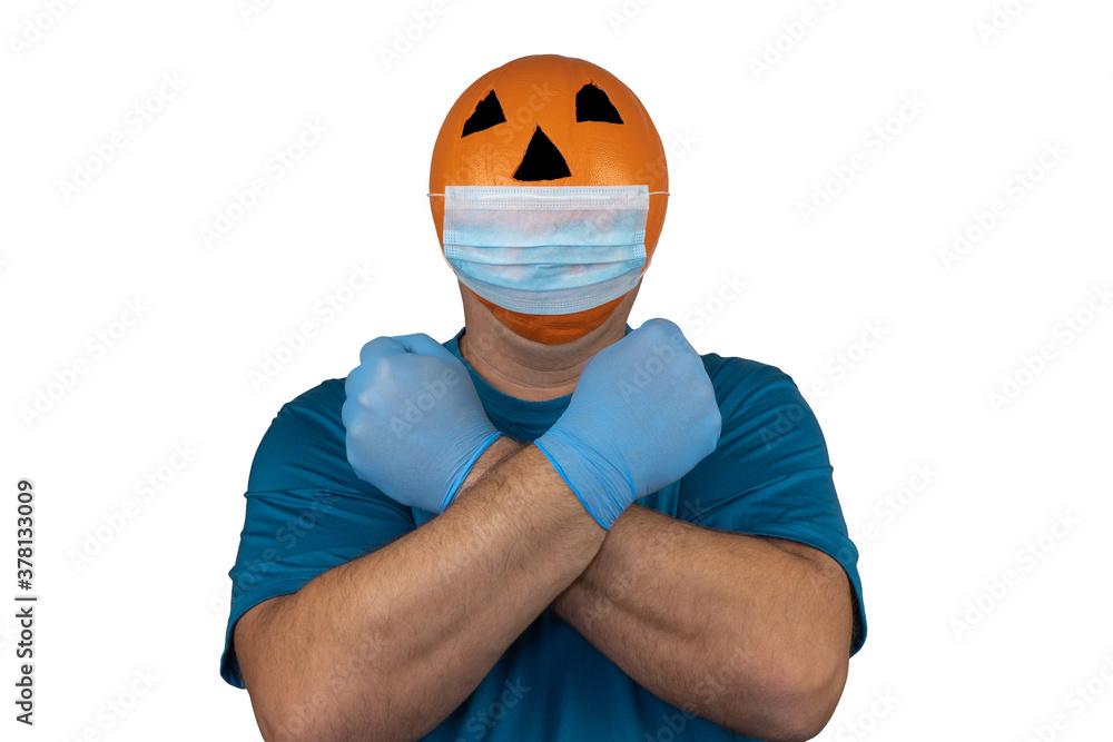 Halloween pumpkin in a medical respiratory bandage. Surgical protective