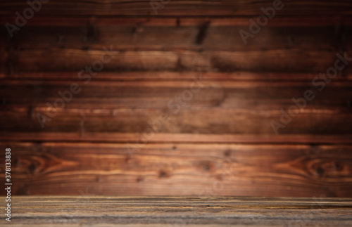 Vintage wood table in wood wall interior