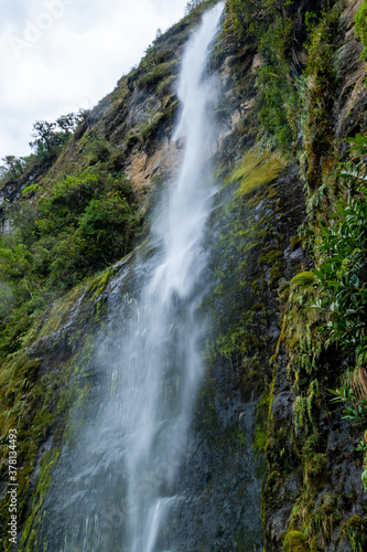 Waterfall from the mountain in free fall in Giron  Ecuador
