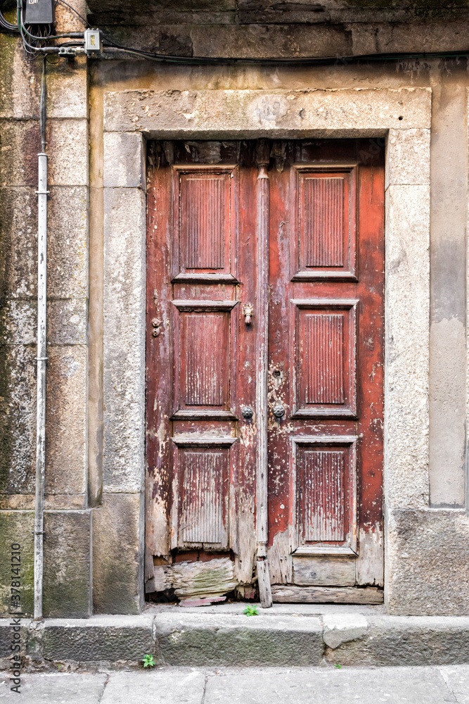 Derelict Ornate Wooden Doors Bordered By Stone, Braga, Portugal 