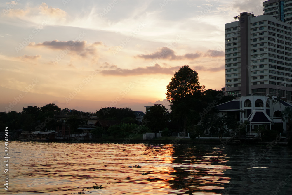 Fototapeta premium Sunset river view on the riverside