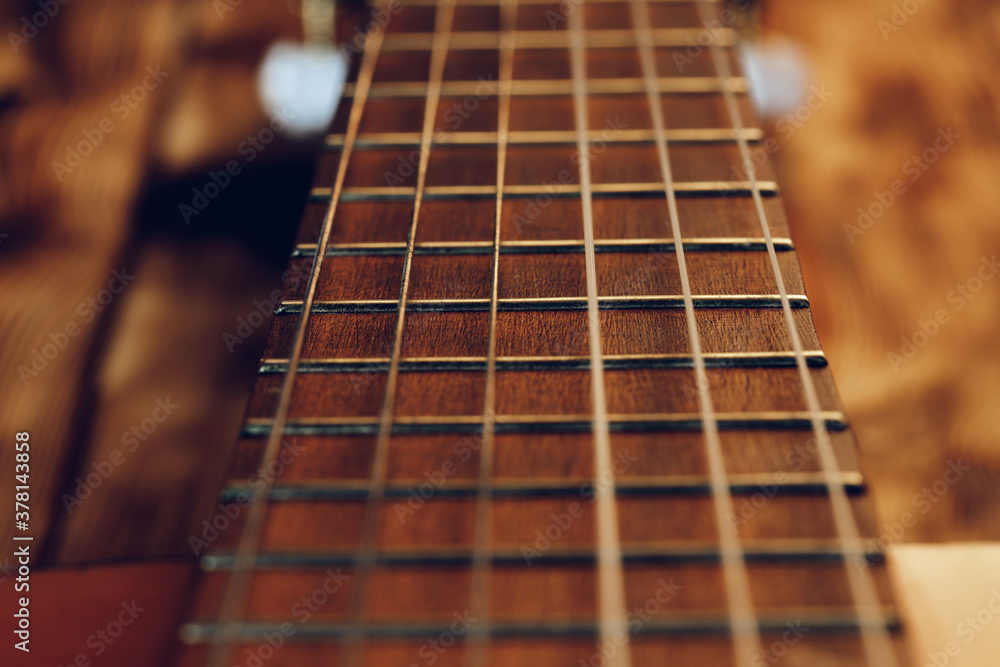 Guitar fingerboard with strings close up photo Guitar fingerboard with strings close up photo
