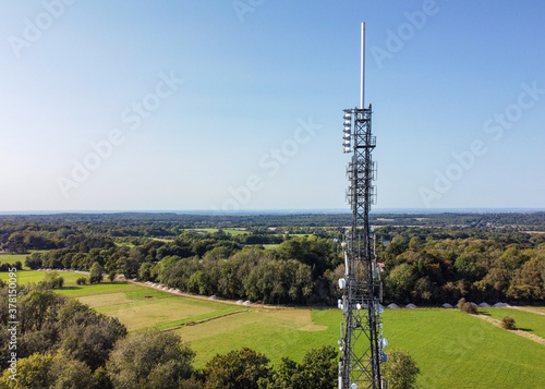 Aerial view of mobile phone mast antennae- UK  photo