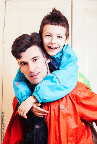 faher and son together having fun at home, lifestyle happy family, people at home photo