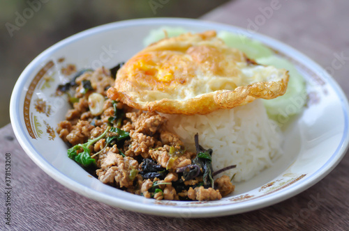 stir fried pork with chili paste, holy basil and fried egg