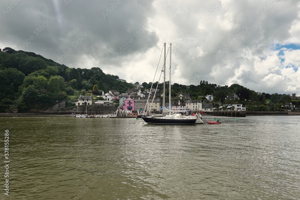The village of Dittisham from a boat on the river Dart. Dittisham is small village located near Dartmouth in Devon UK.