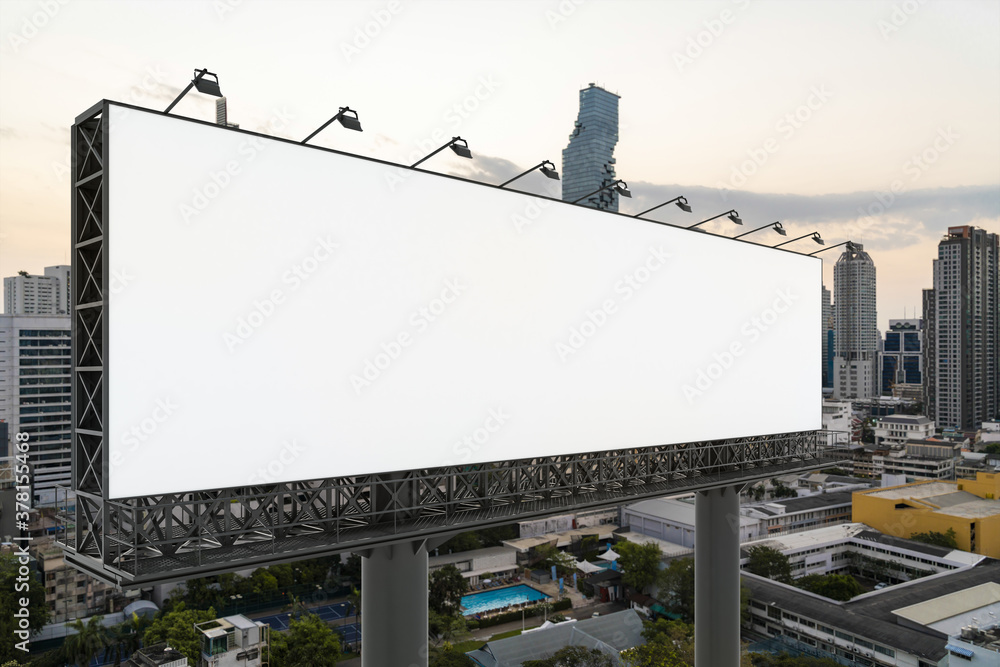 Blank white road billboard with Bangkok cityscape background at sunset. Street advertising poster, mock up, 3D rendering. Side view. The concept of marketing communication to promote or sell idea. Blank white road billboard with Bangkok cityscape background at sunset. Street advertising poster, mock up, 3D rendering. Side view. The concept of marketing communication to promote or sell idea.