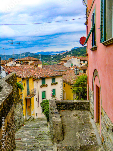 Fotografie View of narrow street in old town of Barga a medieval hilltop town in Tuscany, G