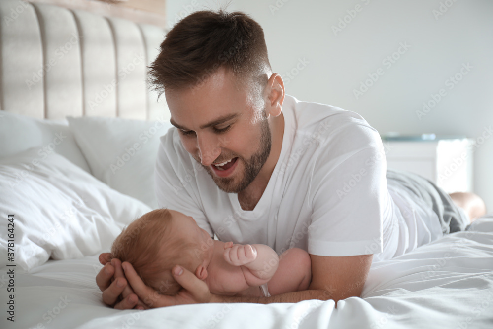 Father with his newborn son at home Father with his newborn son at home