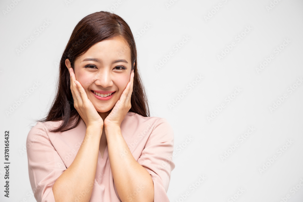 Portrait of excited screaming young asian woman standing in pink dress isolated over white background, Wow and surprised concept Portrait of excited screaming young asian woman standing in pink dress isolated over white background, Wow and surprised concept