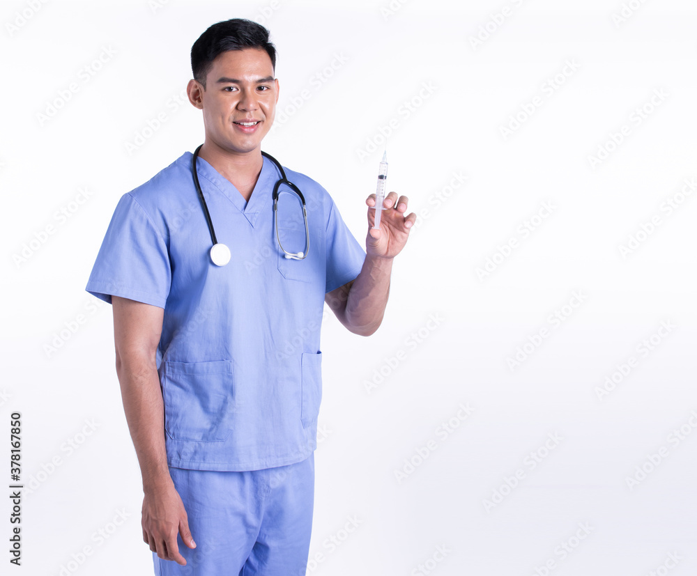 Asian male doctor wearing uniform and using syringe for virus protection Asian male doctor wearing uniform and using syringe for virus protection