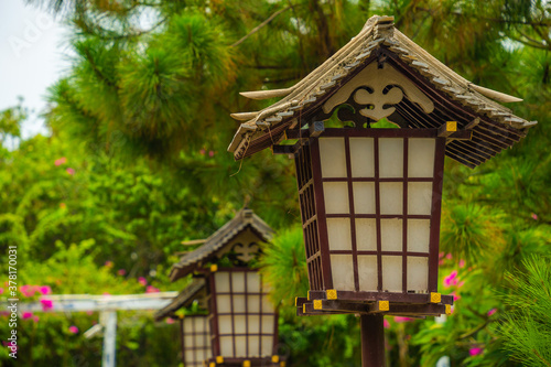 japanese style wooden lamps inside Khanh An monastery, Ho Chi Minh city, Vietnam - little Japan in Saigon. Travel and landscape concept. © CravenA