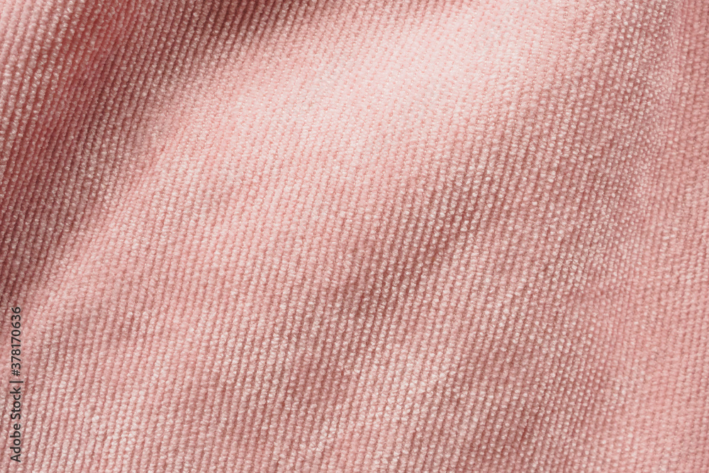 Fototapeta premium Pink fabric cloth texture background close up