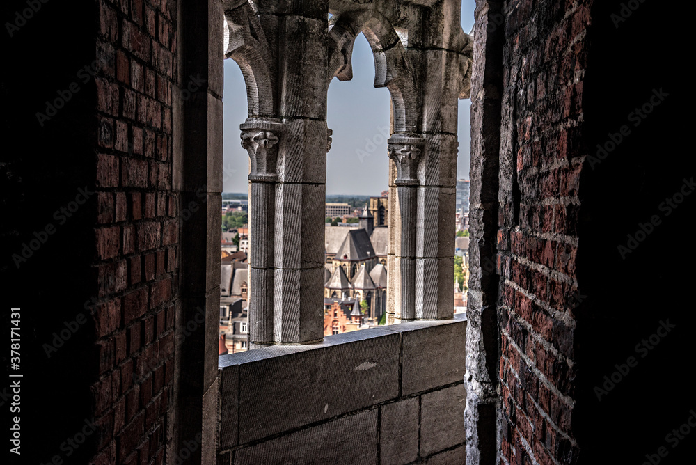 Gothic arches on the belfry of Gand
