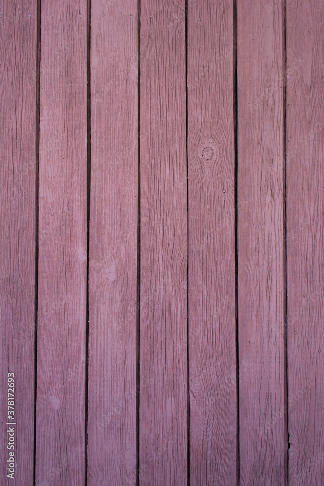 Fototapeta premium texture of old wooden boards painted pink