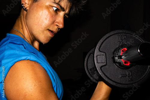 person lifting weights photo