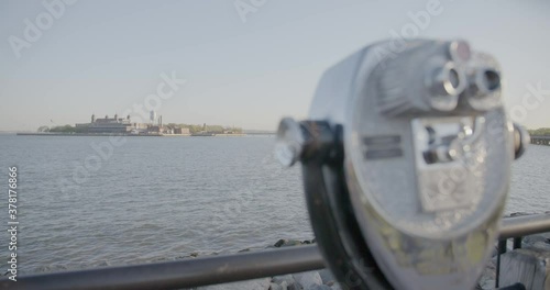 Binoculars view Ellis Island, close up