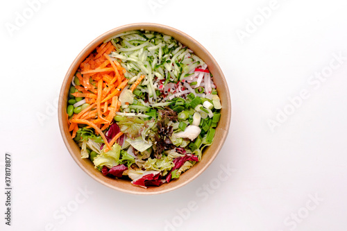 Wallpaper Mural Healthy flatlay salad in kraft paper packaging on a white table. Vegetables cut into strips. Fitness food. Lunch. Nutrition concept. Copy space. Torontodigital.ca