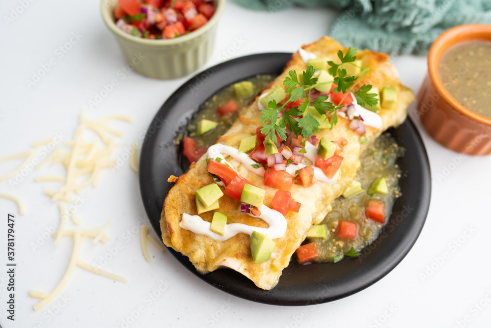Honey lime chicken enchiladas with toppings Honey lime chicken enchiladas with toppings