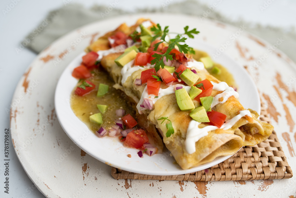 Honey lime chicken enchiladas with toppings