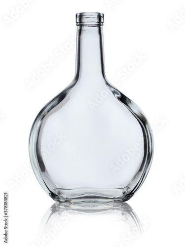 Empty open round glass brandy bottle isolated on white background with reflection