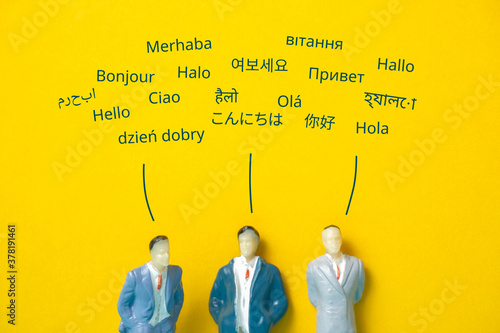 Abstract people in different languages say hello. Translation concept. photo