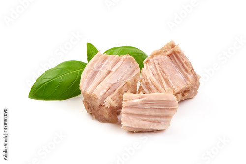 Canned Pork Meat with basil leaves, isolated on white background