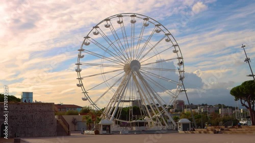 Wallpaper Mural Static view of ferris wheel and colorful evening sky, Antibes, France Torontodigital.ca