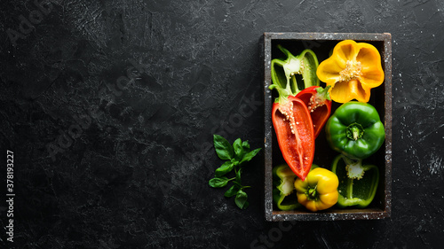 Sweet colored bell pepper. Fresh vegetables. Top view. Free space for your text. photo