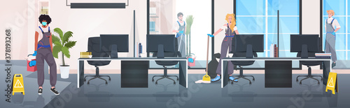mix race cleaners team cleaning and disinfecting floor to prevent coronavirus pandemic modern office interior horizontal full length vector illustration