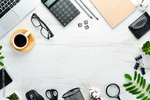 Office white desk. Laptop and accessories. Top view. Free space for your text. Flat lay.