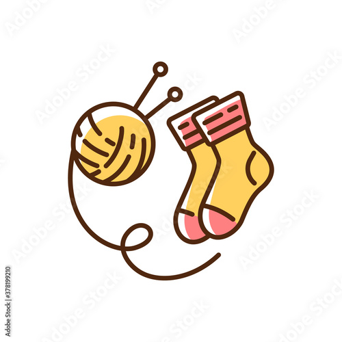 Hand knitted socks RGB color icon. Indoor hobby. Handmade wool socks. Christmas yellow stocking. Life simple pleasures. Hyggelig time having. Coziness mood. Isolated vector illustration