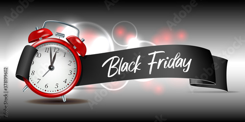 Curved paper banner ribbon with Black Friday inscription and realistic red alarm clock.
