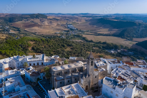 Andalusian town of Vejer de la Frontera with beautiful countryside on the back photo