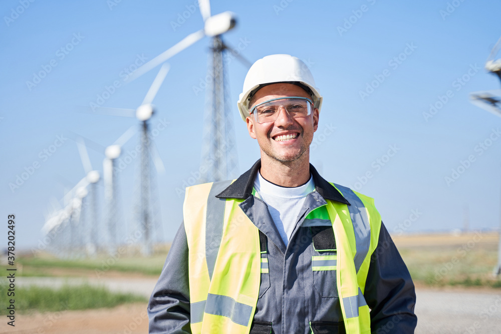 Portrait of smiling worker in hardhat Portrait of smiling worker in hardhat