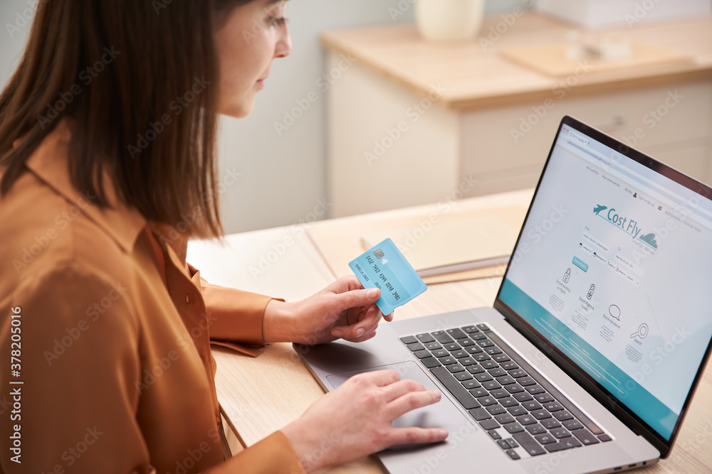 Crop female buying plane tickets online Crop female buying plane tickets online